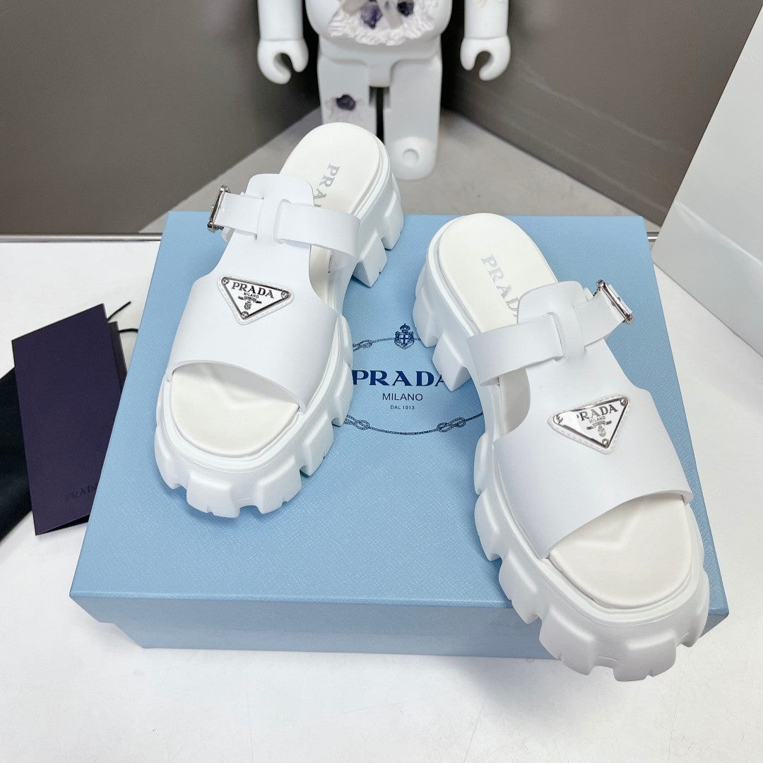 MONOLITH SLIPPER SANDALS IN WHITE RUBBER