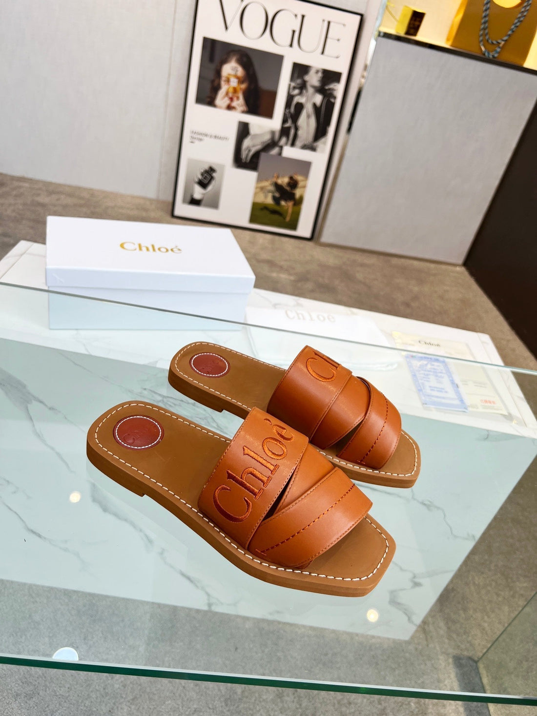WOODY MULE IN BRONZE BROWM LAMBSKIN WITH EMBROIDERED LOGO