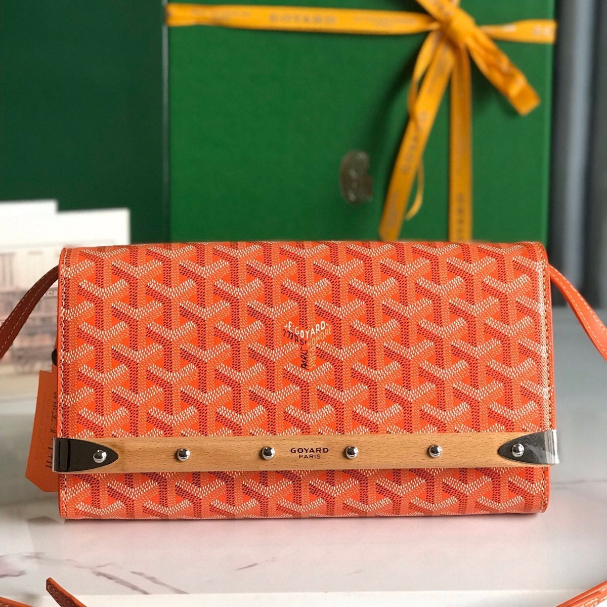 MONTE-CARLO PM CLUTCH 25 IN ORANGE GOYARDINE CANVAS