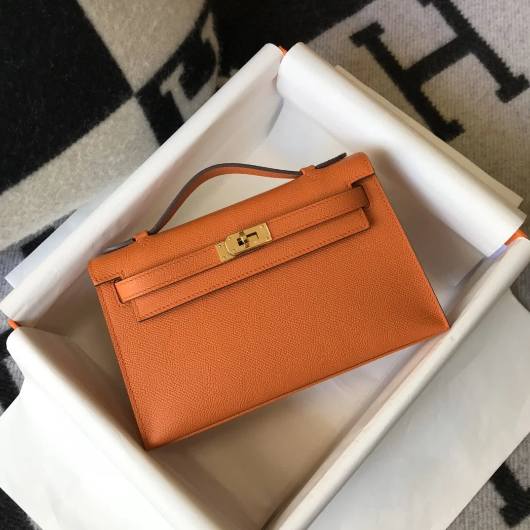 Herm猫s Kelly Pochette Mini Bag Orange