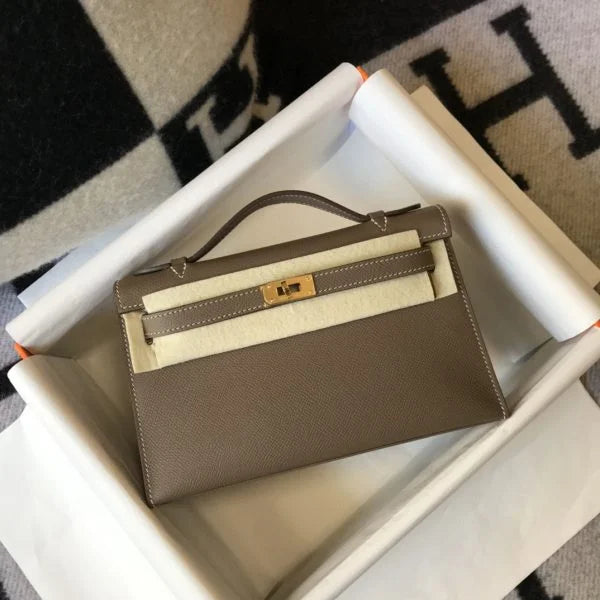 Herm猫s Kelly Pochette Mini Bag Brown