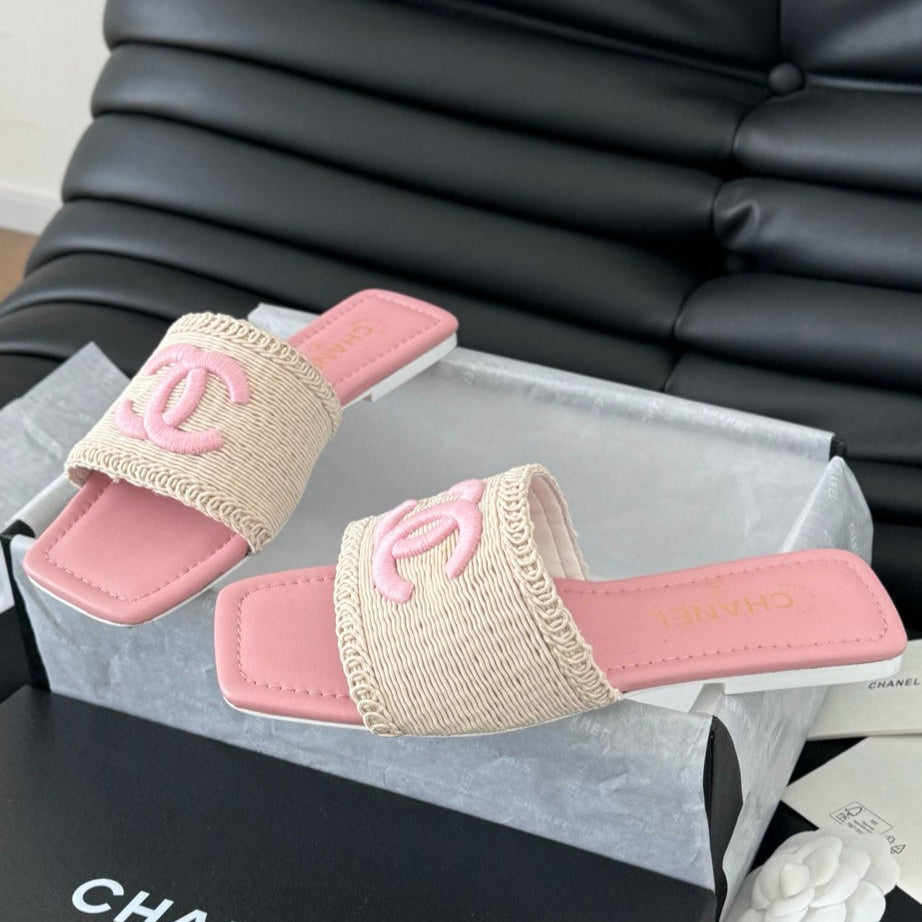 WOVEN SLIDE IN RAFFIA AND LIGHT PINK LAMBSKIN