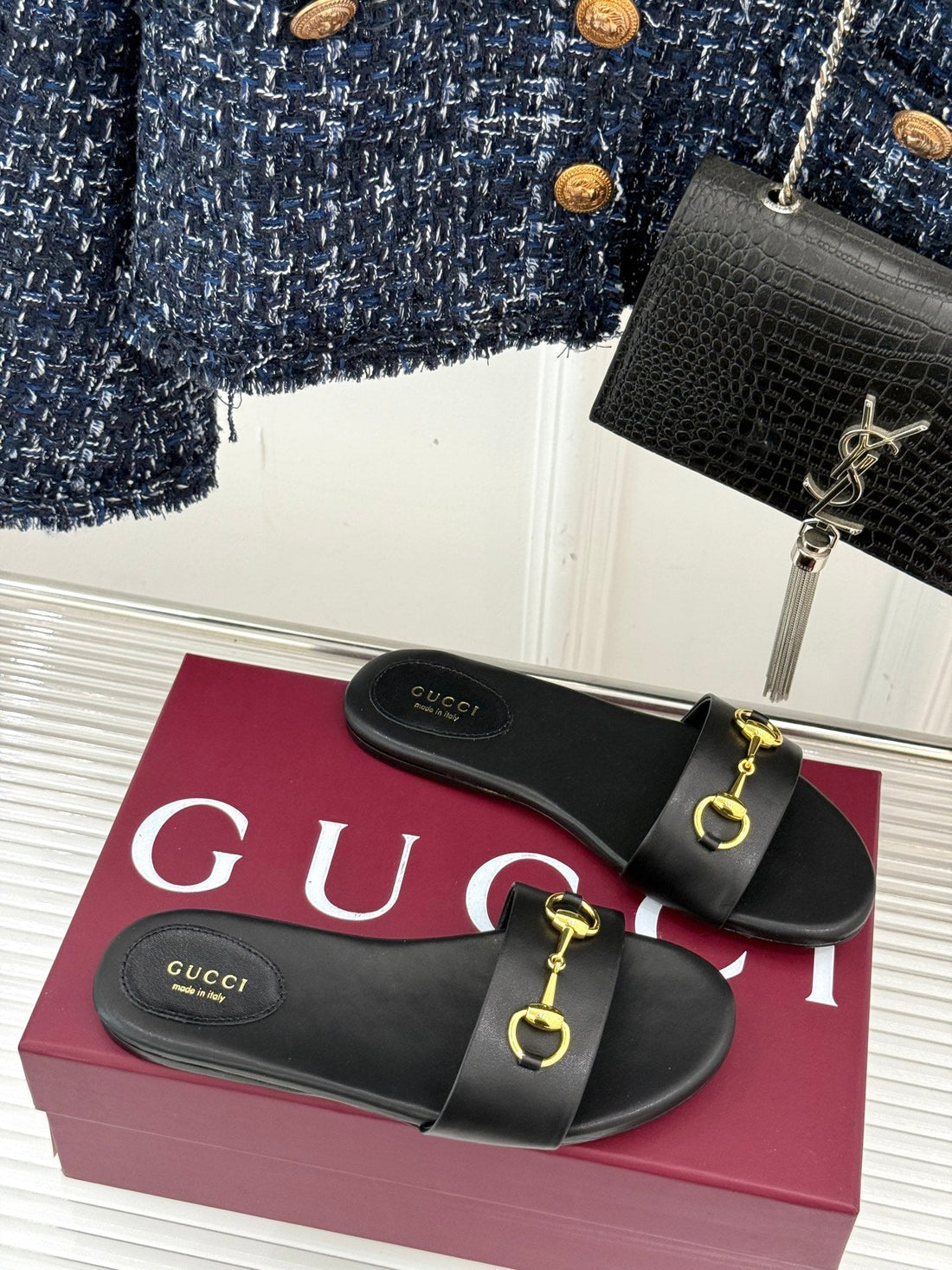 SLIDE SANDALS IN BLACK CALFSKIN WITH GOLD HARDWARE