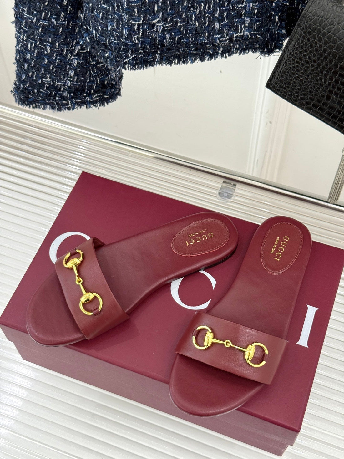 SLIDE SANDALS IN RED CALFSKIN WITH GOLD HARDWARE