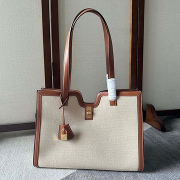 CABAS 37 IN WHITE CANVAS AND BRONZE BROWN CALFSKIN TRIM GOLD LOCK
