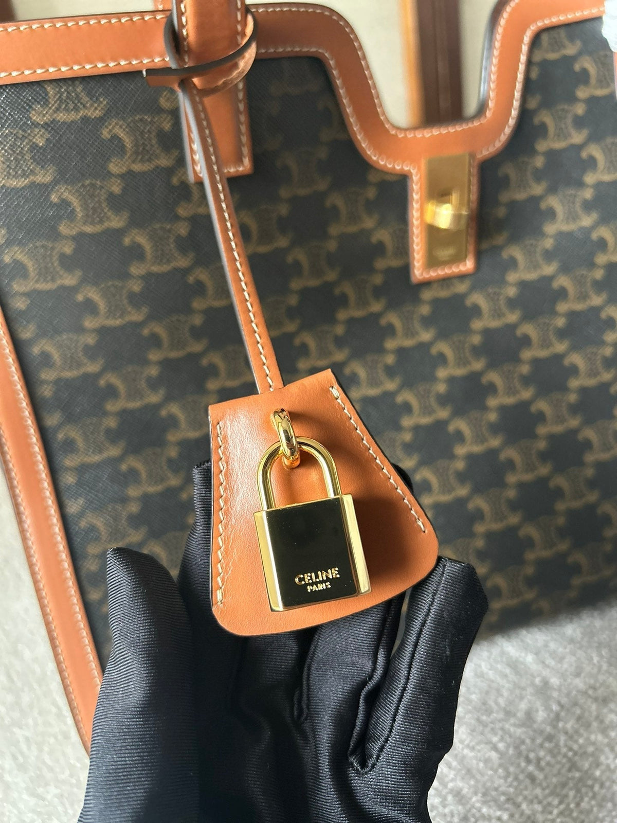 CABAS 37 IN BLACK TRIOMPHE CANVAS AND BRONZE BROWN CALFSKIN TRIM GOLD LOCK
