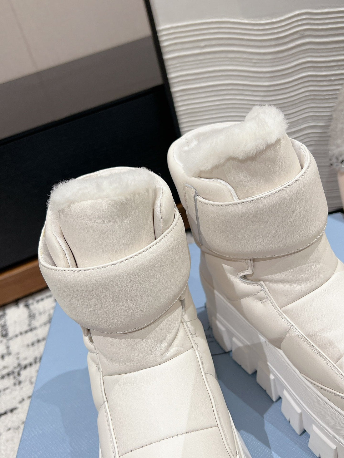 MONOLITH ANKLE BOOTS WITH STRAP IN RICE WHITE CALFSKIN AND FLEECE LINING