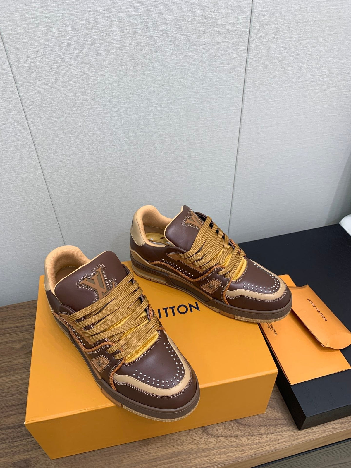 LV WOMEN'S TRAINER IN MARRON CALFSKIN