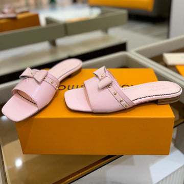 LV X TM 6AM FLAT MULE IN BABY PINK CALFSKIN