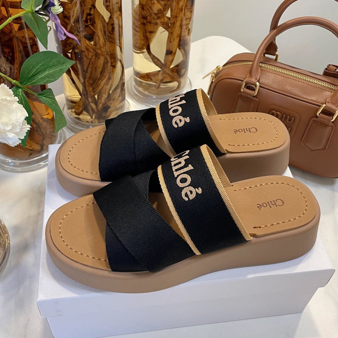 WOODY WEDGE SANDALS IN BLACK CANVAS WITH CIDER BROWN RUBBER SOLE