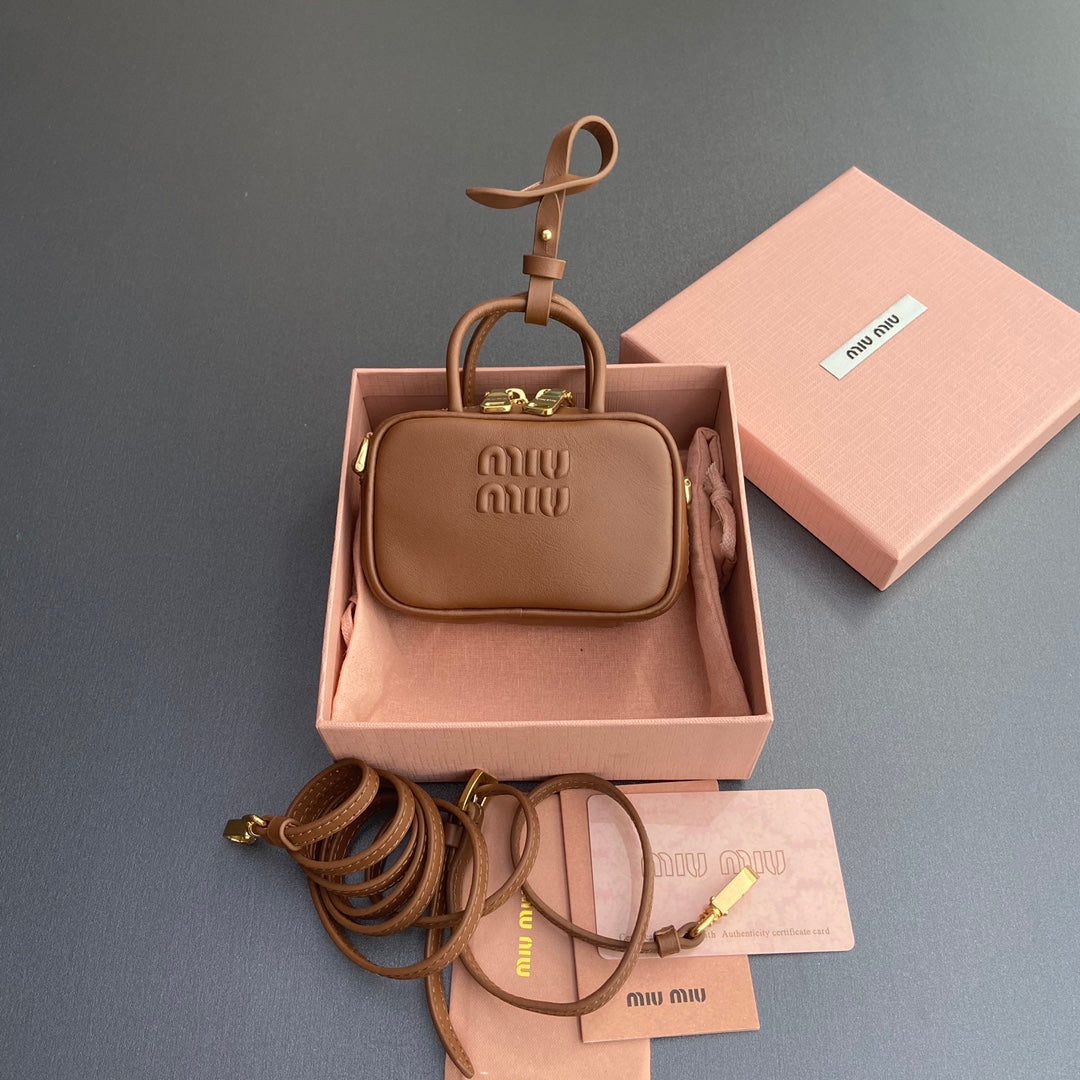MICRO BAG KEYCHAIN 11 IN CAPE PALLISER BROWN CALFSKIN EMBOSSED LOGO