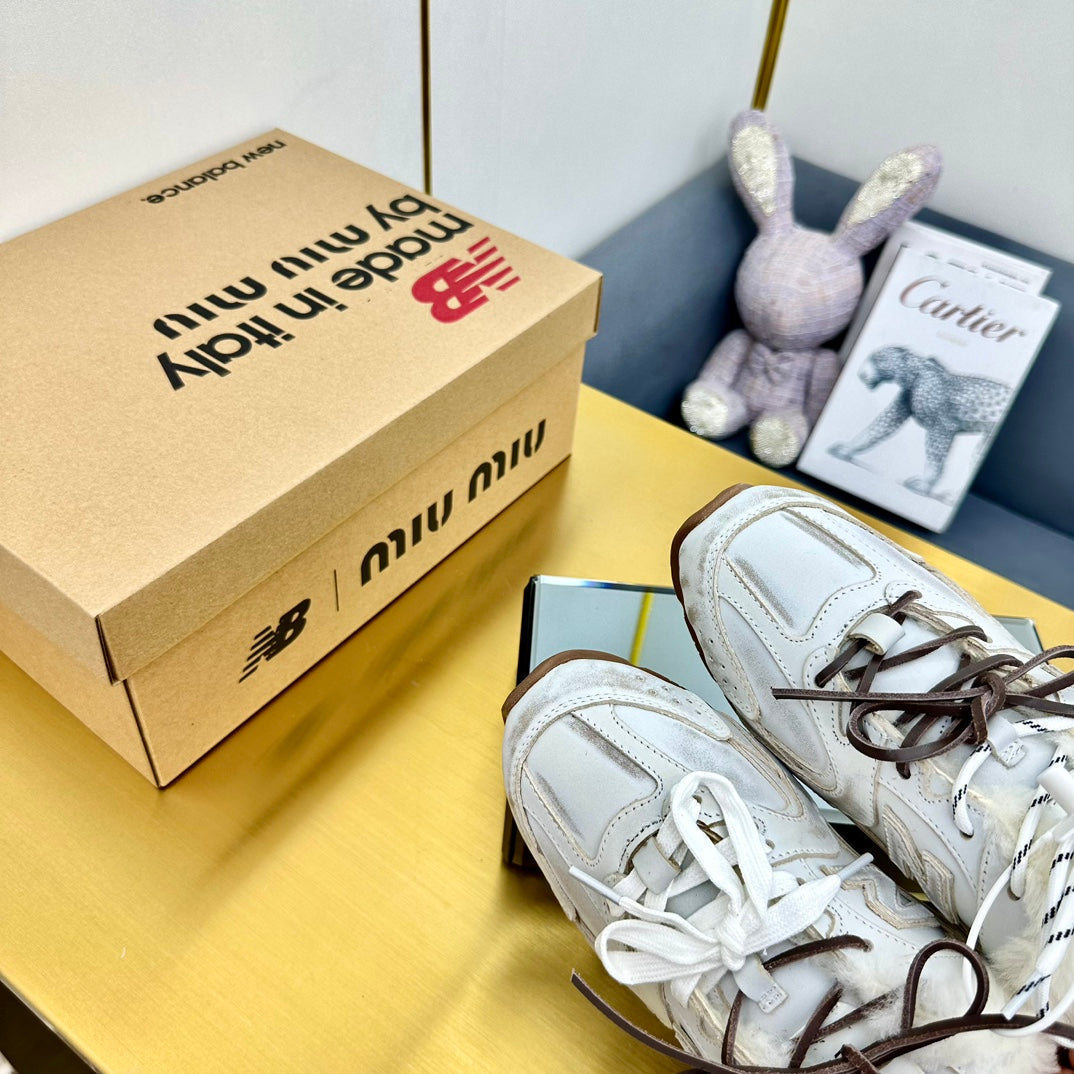 MIUxNB 530 SNEAKER MULES IN DISTRESSED WHITE CALFSKIN SHEARLING