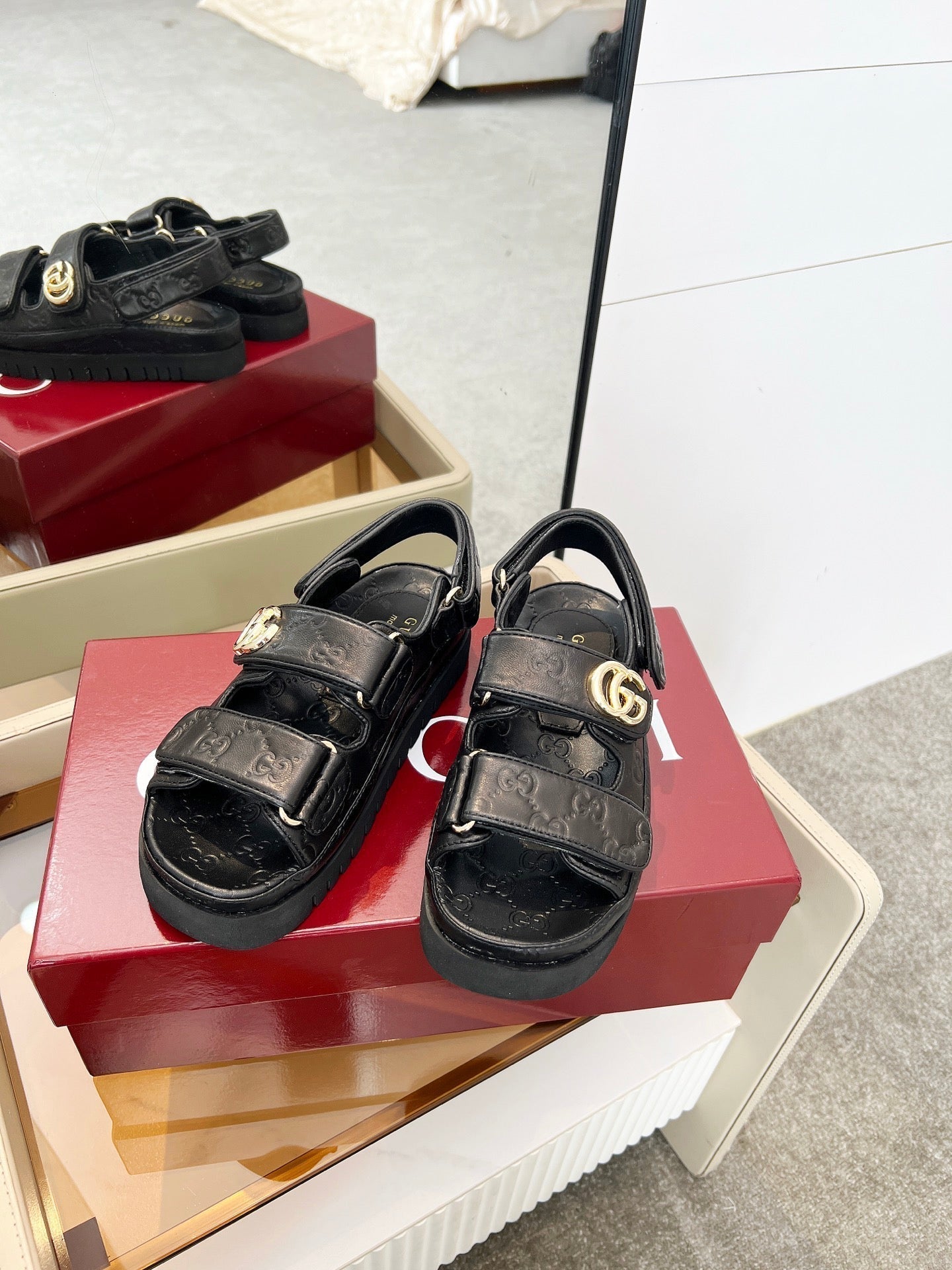 VELCRO STRAP SANDALS IN BLACK EMBOSSED LOGO LAMBSKIN GOLD HARDWARE