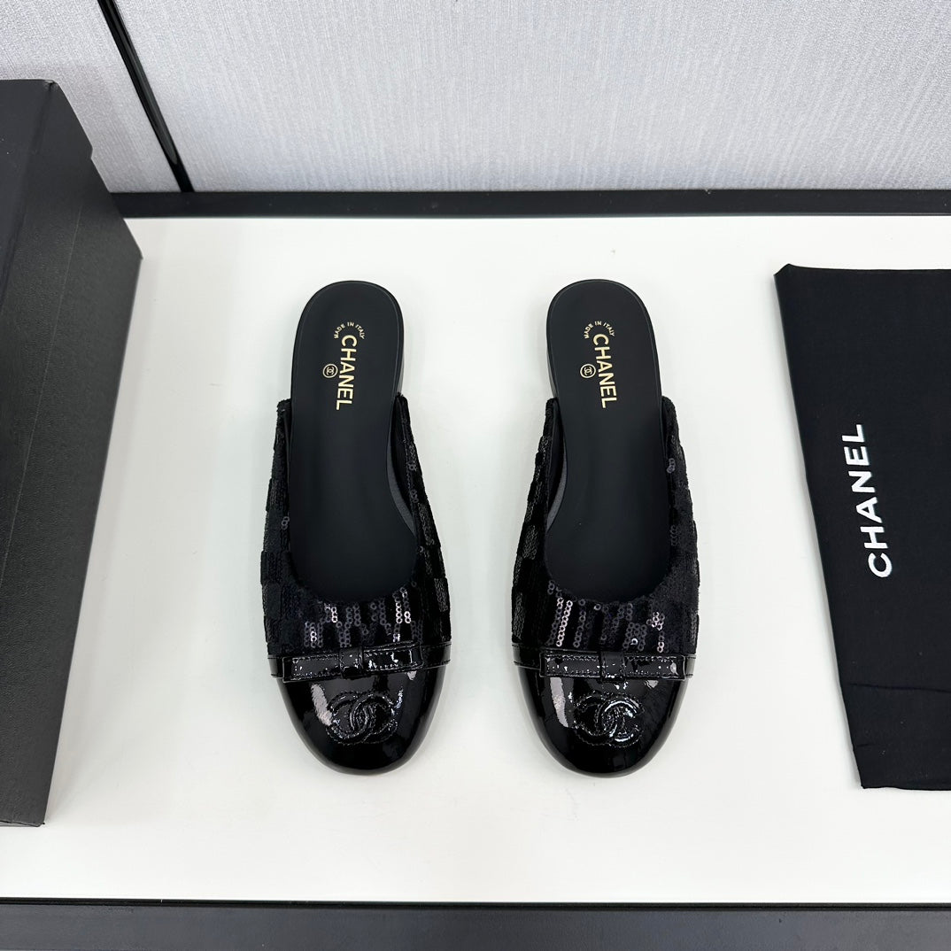 BOW MULE IN BLACK FABRIC AND CALFSKIN
